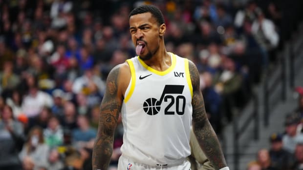 Utah Jazz forward John Collins (20) reacts in the fourth quarter against the Denver Nuggets at Ball Arena.